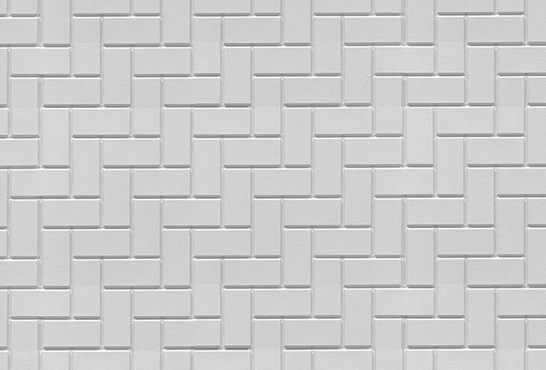 Modular herringbone formliner pattern cast in concrete