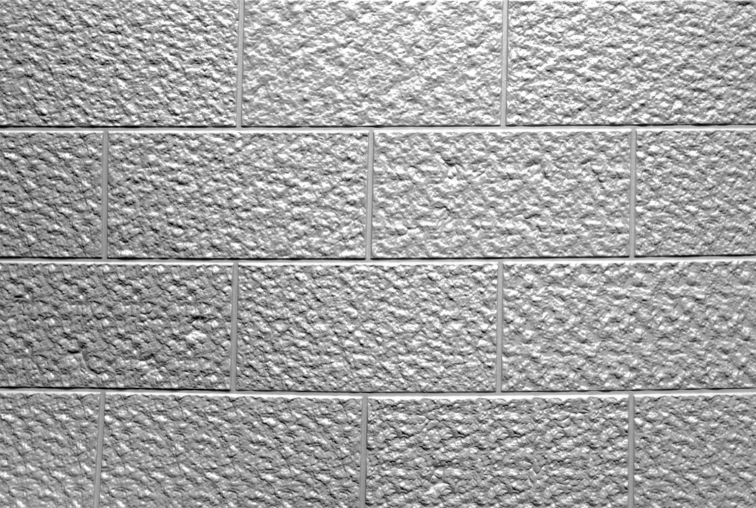 Half bond 112x24 split faced block formliner pattern cast in concrete