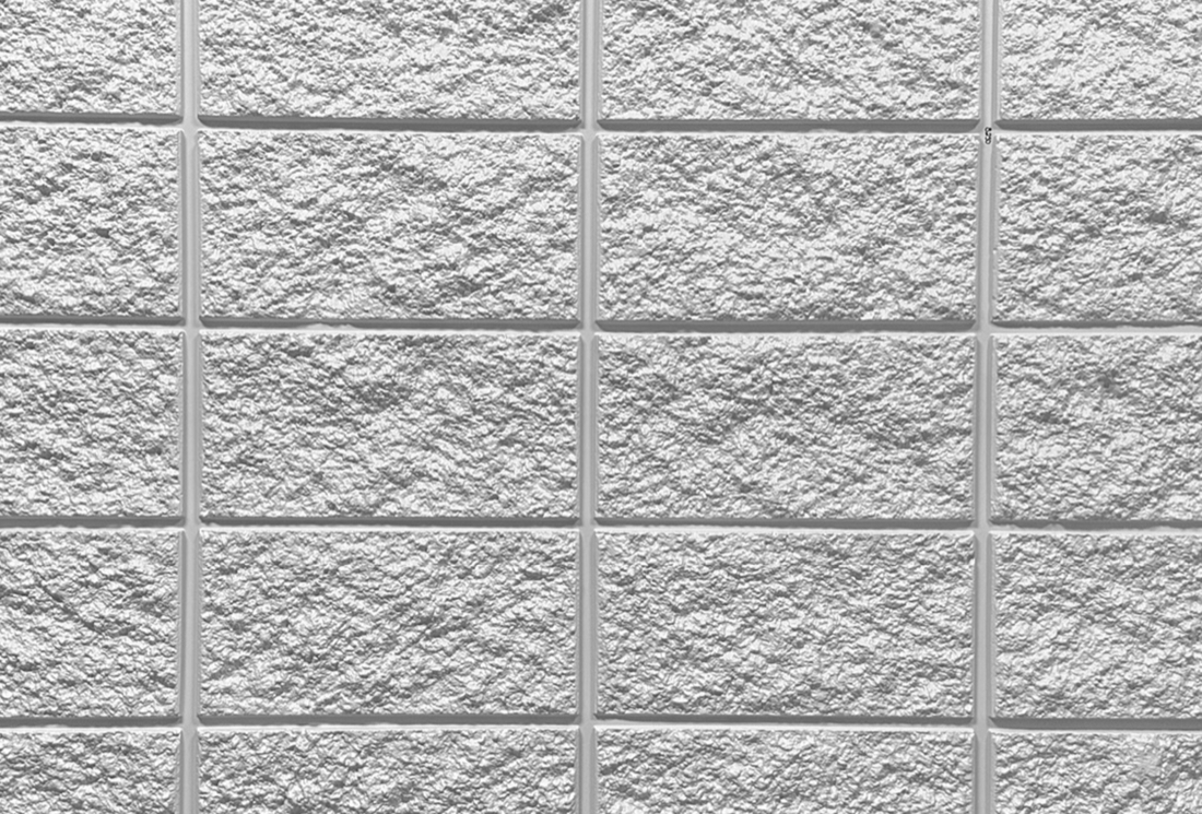 Stacked bond 8x16 block split face block formliner pattern cast in concrete