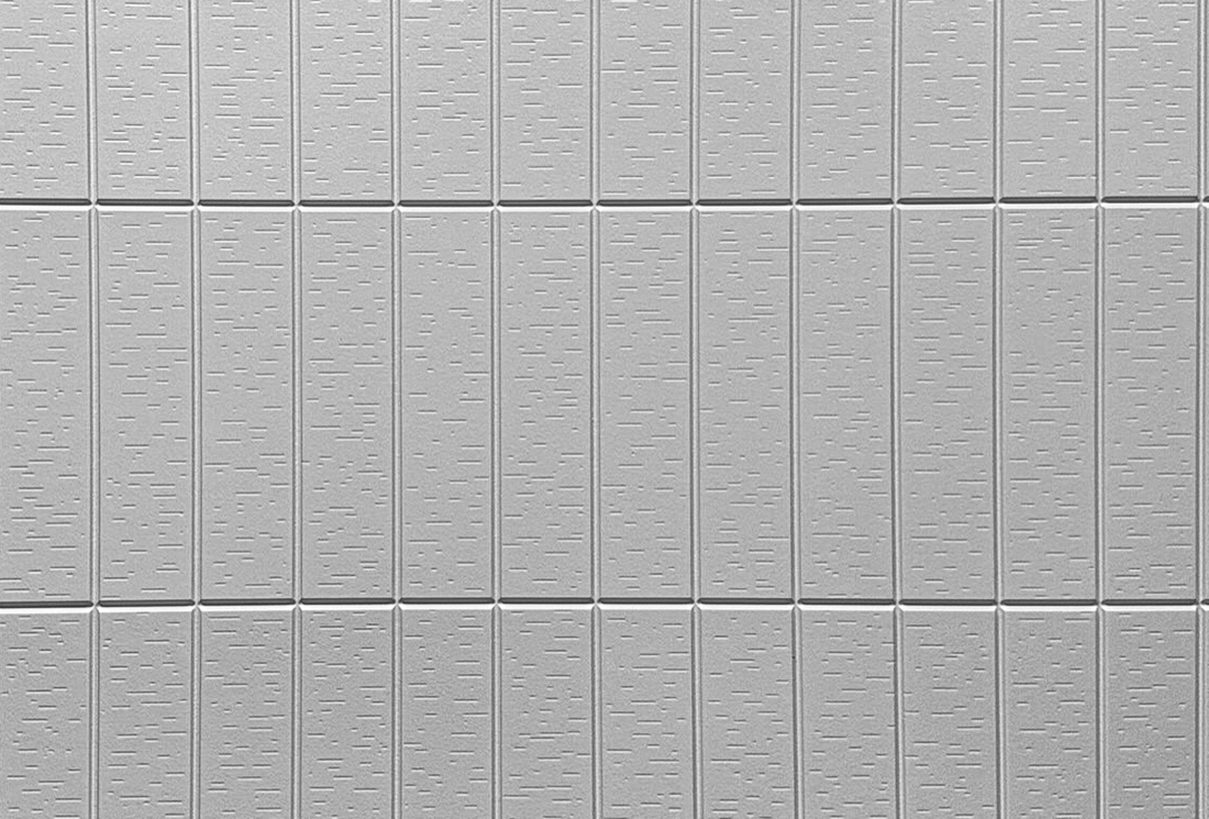 Stacked bond 4x16 block formliner pattern cast in concrete